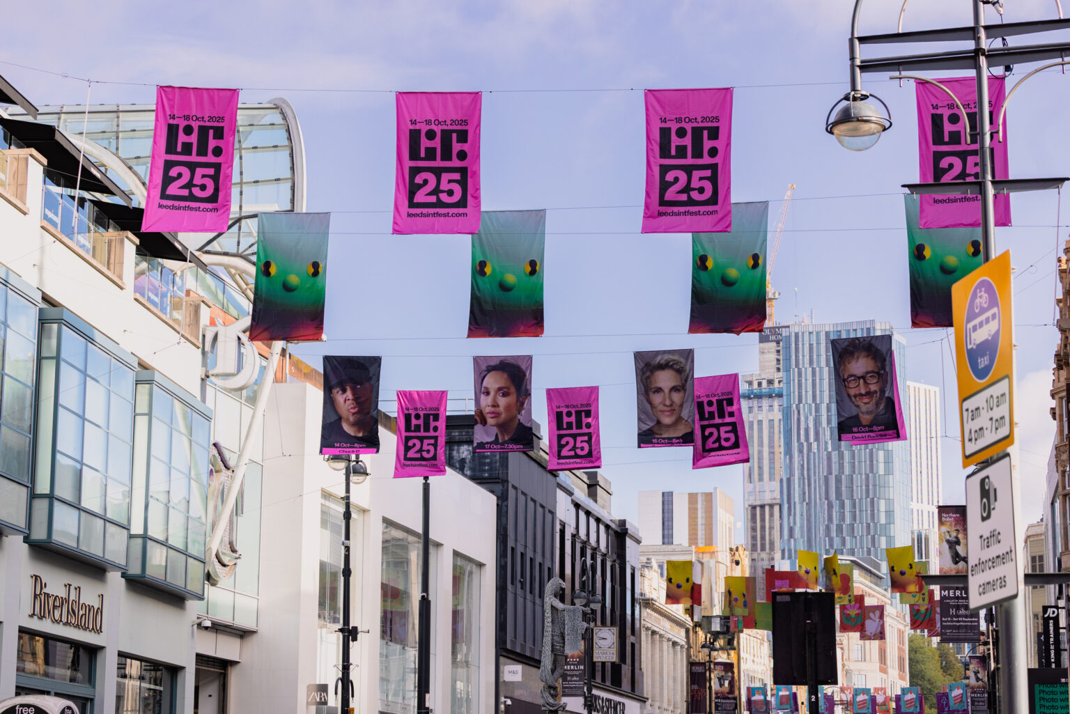 Leeds International Festival of Ideas 2025 flags adorn Briggate 